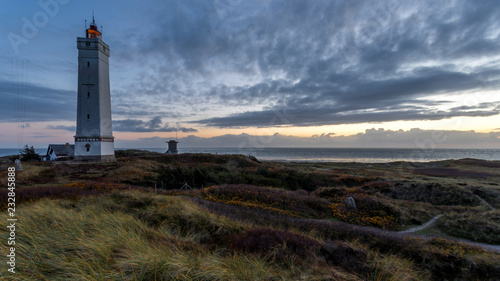 Lighthouse and bunker at a beach in Denmark