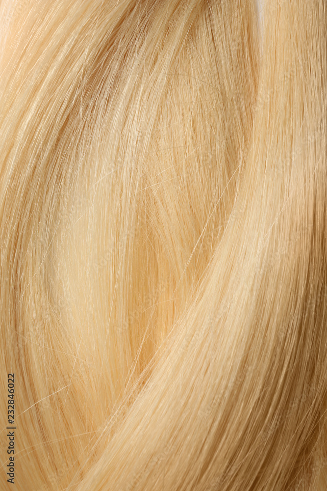 Texture of healthy blond hair as background, closeup Texture of healthy blond hair as background, closeup