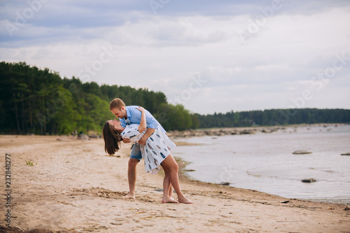 A young family is expecting a baby for a walk