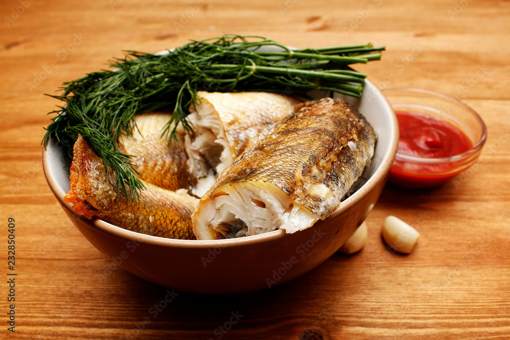 fried pikeperch with ketchup and garlic fried pikeperch with ketchup and garlic