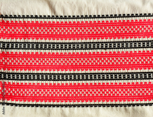 Ukrainian folk embroidery, embroidered pattern on white fabric
