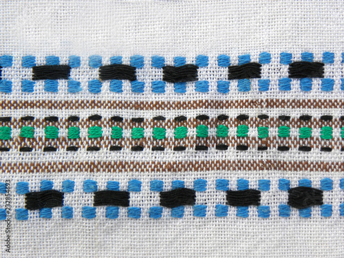 Ukrainian folk embroidery, embroidered pattern on white fabric
