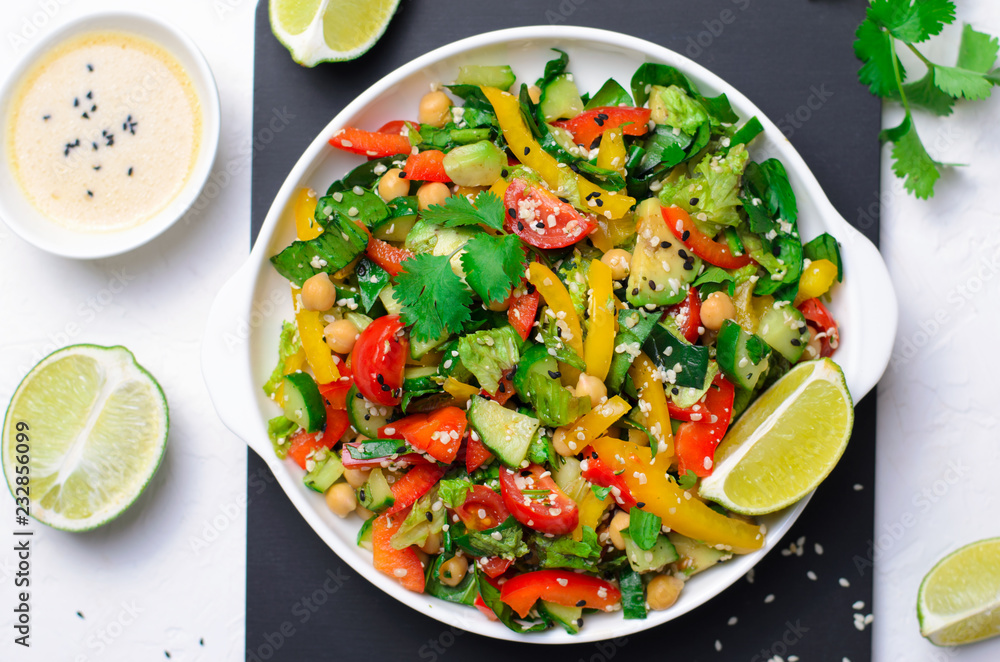 Fresh Vegetable Salad, Healthy Vegan Meal with Avocado, Chickpea, Bell Pepper, Cucumber and Spinach Fresh Vegetable Salad, Healthy Vegan Meal with Avocado, Chickpea, Bell Pepper, Cucumber and Spinach