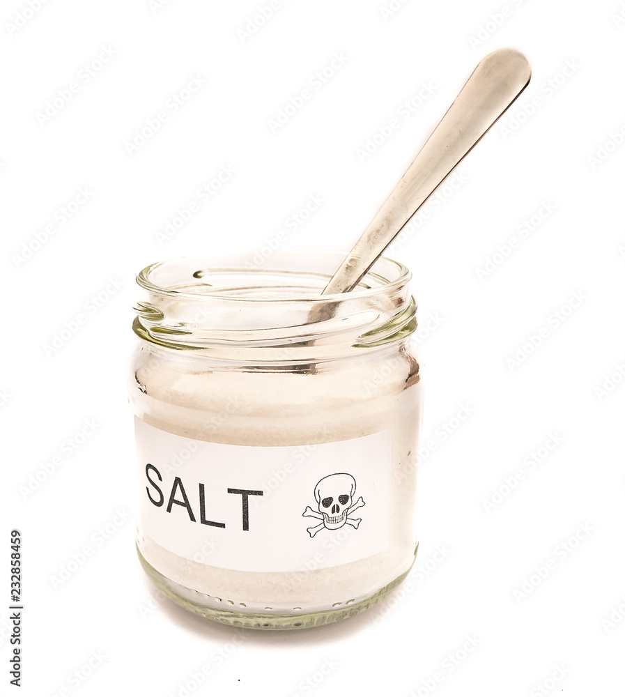 Unhealthy salt and high blood pressure concept with skull symbol Unhealthy salt and high blood pressure concept with skull symbol