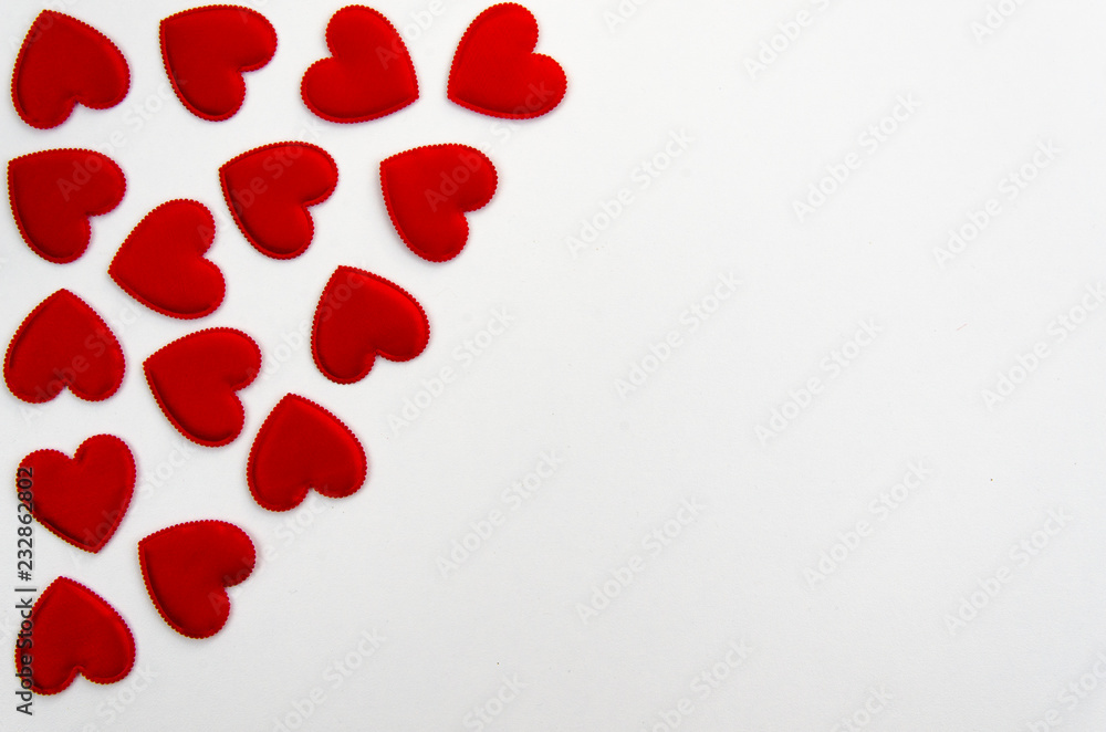 Red heart shaped confetti background or corner border over white. Top view, flat lay Red heart shaped confetti background or corner border over white. Top view, flat lay