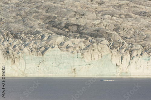 ice floes floating on the lake  glacier in the background  Iceland