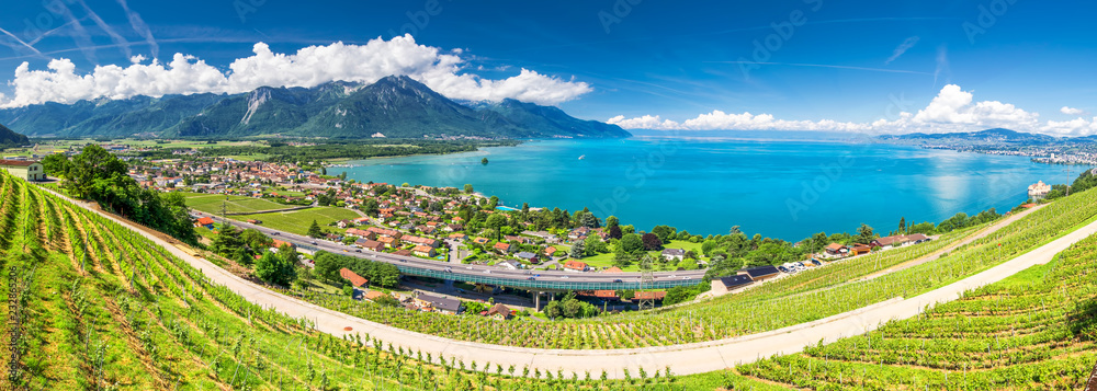 Fototapeta premium Panorama view of Montreux city with Swiss Alps, lake Geneva and vineyard on Lavaux region, Canton Vaud, Switzerland, Europe
