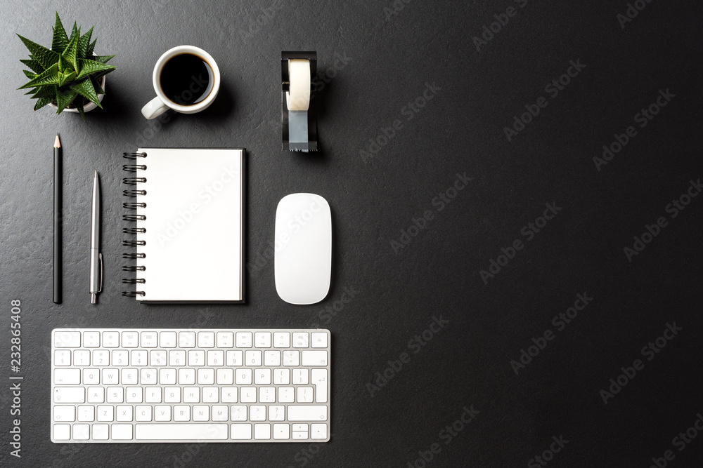 Business accessories on dark background with copy space