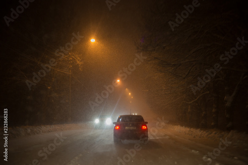 A view from the car riding at snowy road