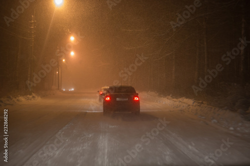 A view from the car riding at snowy road © Valeriy