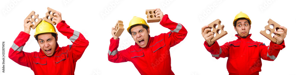 Construction worker with clay bricks on white Construction worker with clay bricks on white