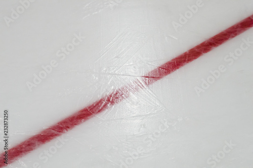 Photography Ice hockey rink red markings closeup, winter sport background