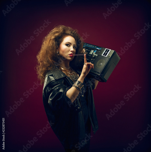 Girl with boom box and bubble gum, 1980's style