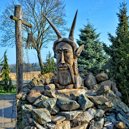 Pagan idol. Decoration of exterior of Hotel Pajero. Polish Motel is located 20 km from the border with Belarus. Horbov-Kolonia, Poland 