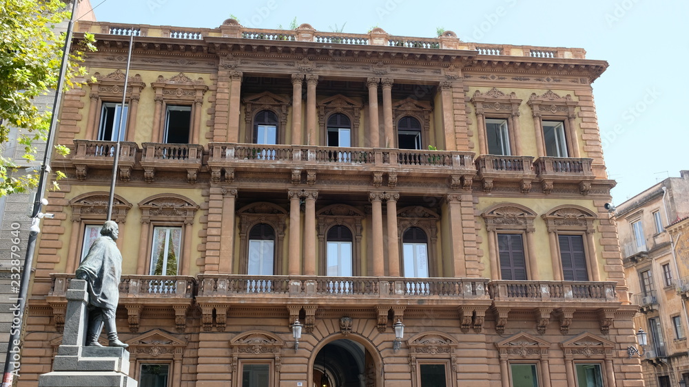 Catania, Sicily. Facade of palazzo Pancari Ferreri, building between 1875 and 1892 in a Liberty Style, also called Italian Art Nouveau. In front of it, there is a Garibaldi statue.