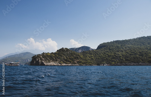 Boat  Cliffs  Clouds  and Sea