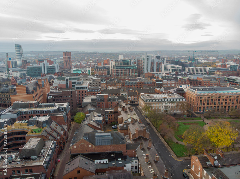 Obraz premium Leeds town centre aerial photo taken on a partly cloudy day.