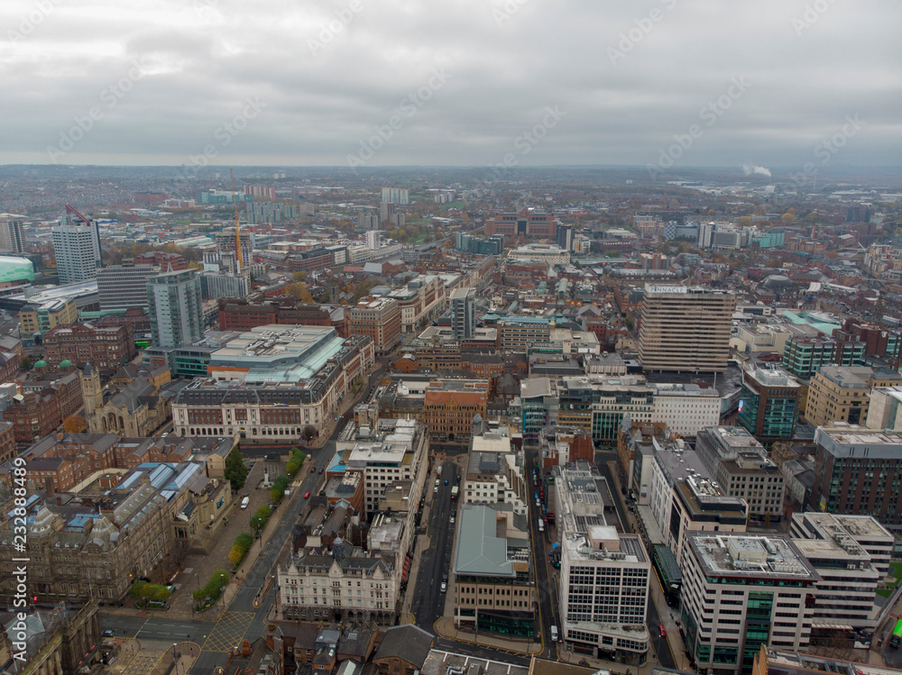 Leeds town centre aerial photo taken on a partly cloudy day.