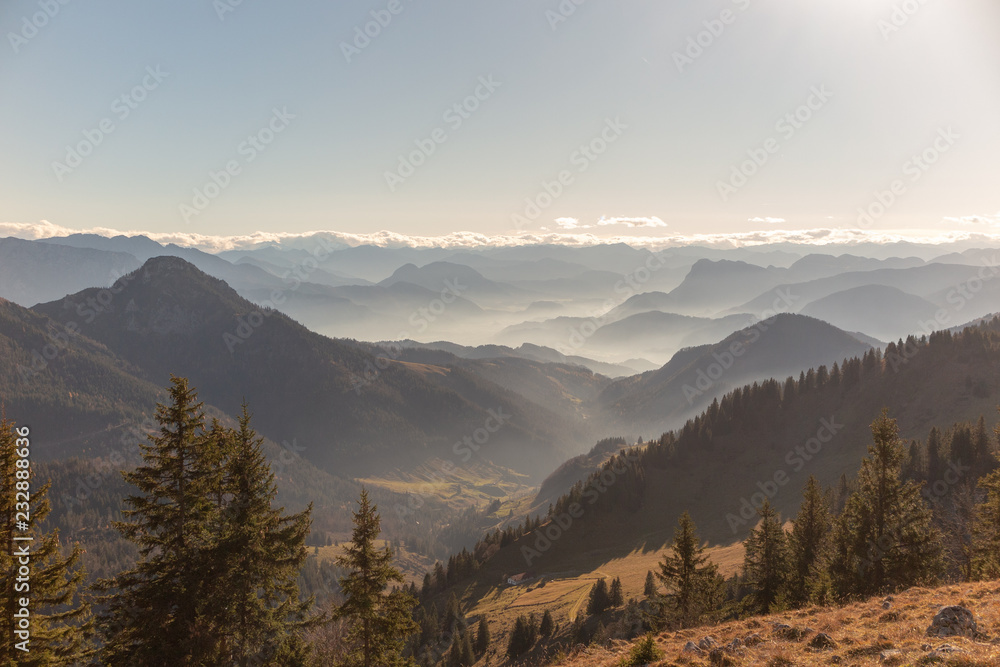 Fototapeta premium Mountain, fog clouds and silhouettes