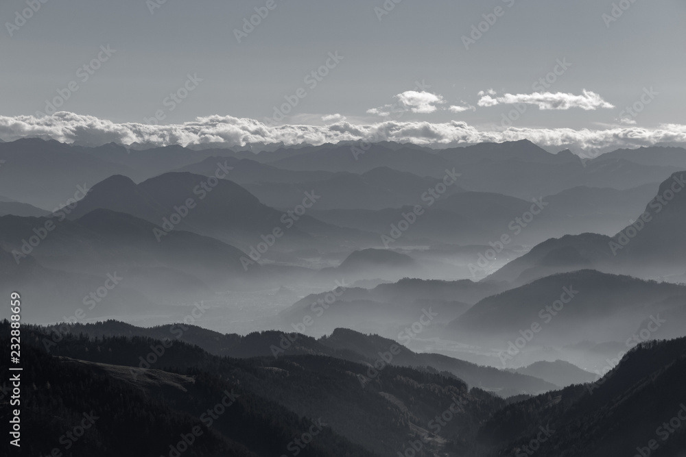 Obraz premium Mountain, fog clouds and silhouettes (b/w)