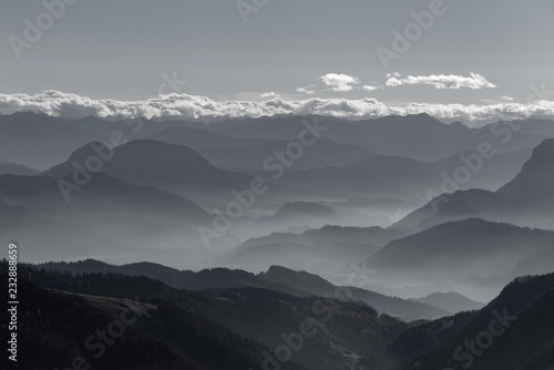 Mountain, fog clouds and silhouettes (b/w)
