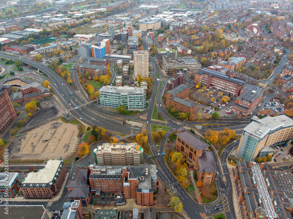 Leeds town centre aerial photo taken on a partly cloudy day.