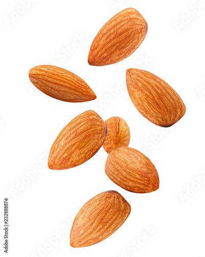 7456485 Falling almond isolated on white background, clipping path, full depth of field photo