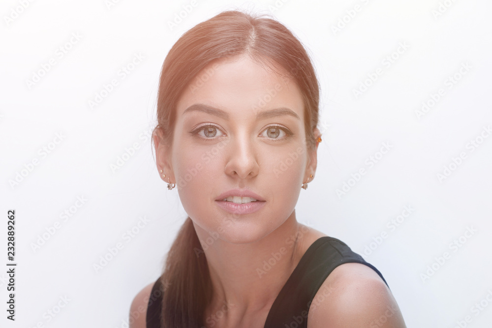 Portrait of a cute young woman. The concept of youth and skin care. Portrait of a cute young woman. The concept of youth and skin care.