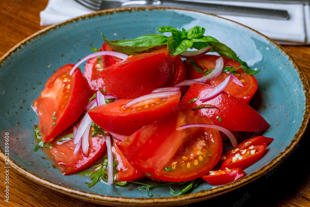 Tomato salad with red onion Tomato salad with red onion