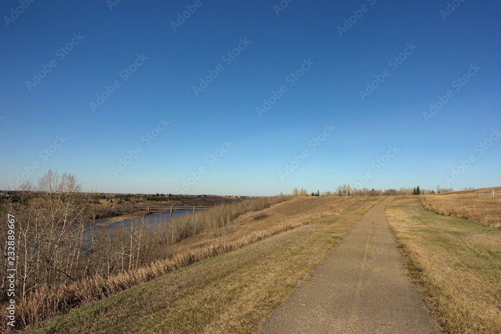 Path in the park along side a river.