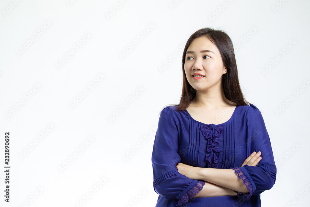 Portrait photograph of smart and good looking Asian women in the blue shirt close up on white background. Studio lighting set up. Portrait photograph of smart and good looking Asian women in the blue shirt close up on white background. Studio lighting set up.
