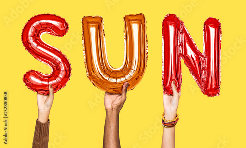 Hands showing sun balloons word