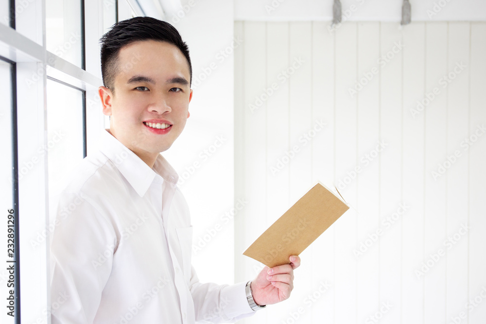 Portrait of smart Asian business man in formal white shirt close up. Portrait of smart Asian business man in formal white shirt close up.