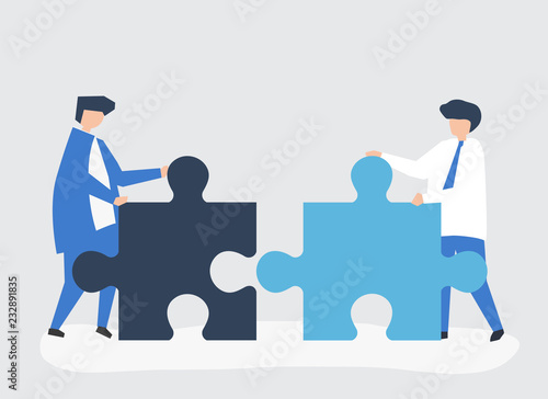 Colleagues connecting jigsaw pieces together