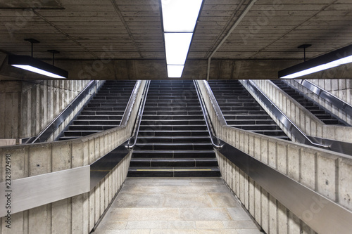 Concrete stairs leading out of underground train station