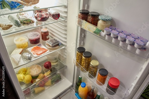 Obraz w ramie Refrigerator door open