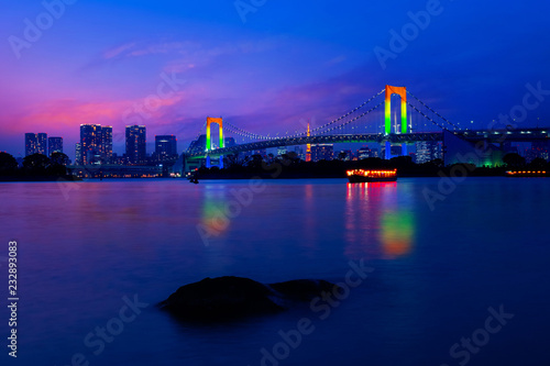 Colorful illuminations at Rainbow Bridge from Odaiba in Tokyo, Japan © coward_lion