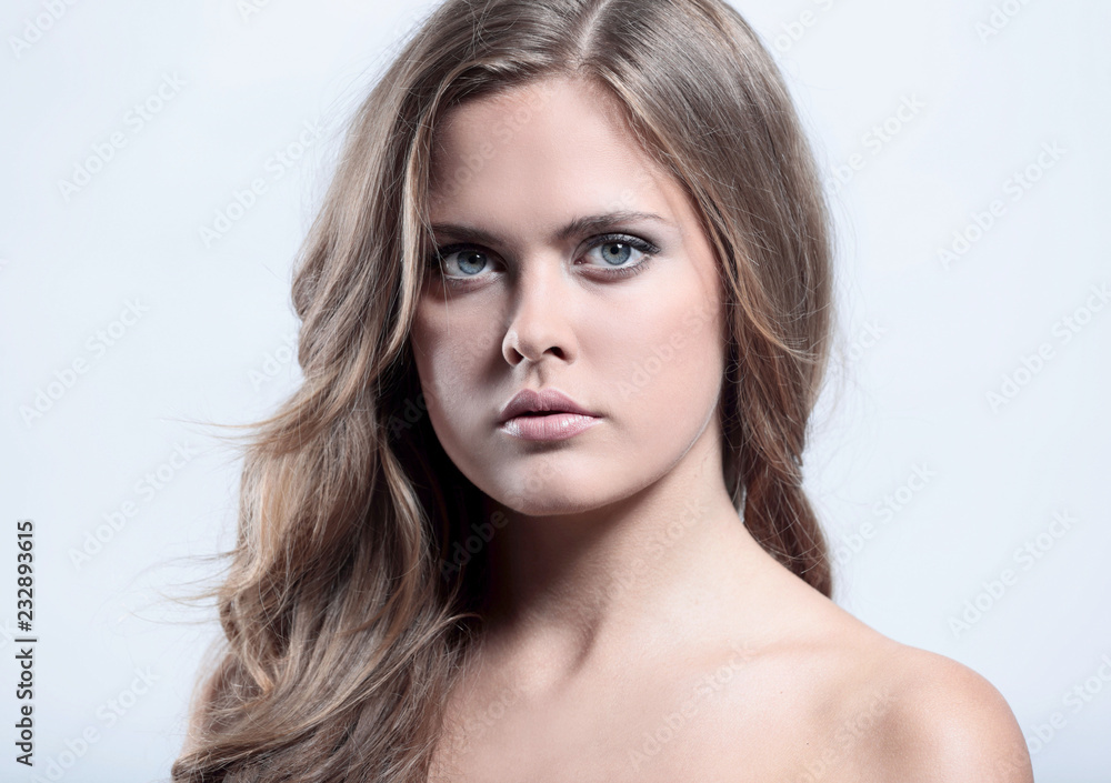 Fototapeta premium Portrait of young happy smiling thinking woman, over grey backgr