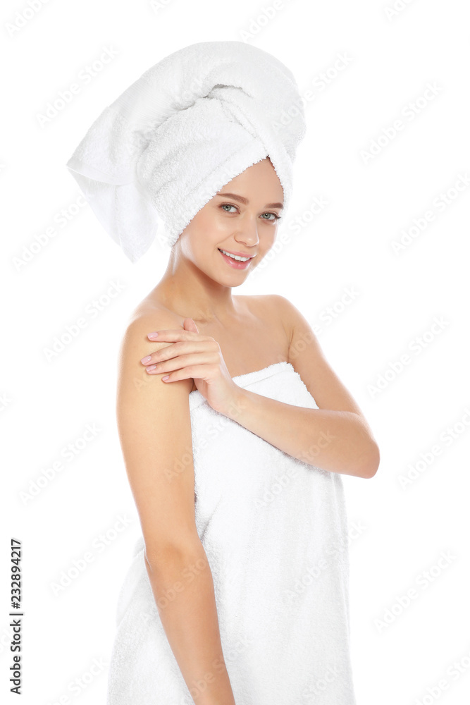 Portrait of young pretty woman with towels on white background Portrait of young pretty woman with towels on white background