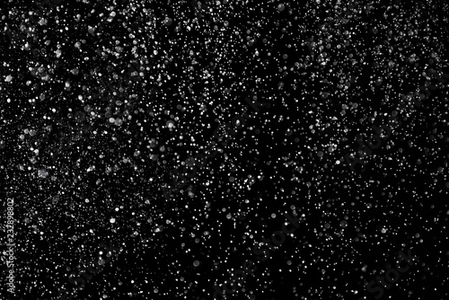 Falling Snow down On The Black Background