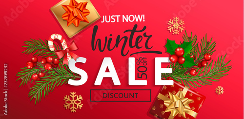 Winter sale banner for Christmas and New Year holidays.50 percent discount card on red background with traditional christmas elements-gift box with gold bow,candy cane, branch.Vector illustration.