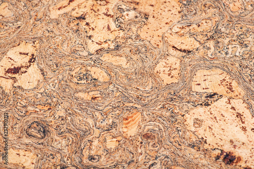 Macro shot of natural brown cork board like art seamless texture, background