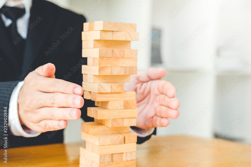 Businessman plan and strategy in business Domino Effect Problem solution Businessman plan and strategy in business Domino Effect Problem solution
