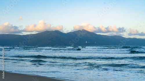 Amazing sea with waves and mountains on the sunset in Vietnam,Danang city