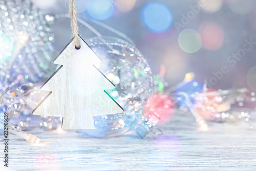 christmas theme background with glass ball and defocused glowing lights