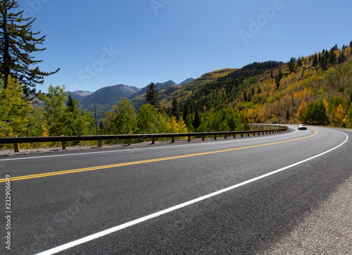 road in mountains,Fast Road Through The Countryside,Image related to unexplored road journeys and adventures.Road through the scenic landscape to the destination in Smoky natural park