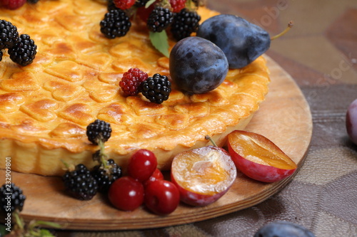 pie with prunes and forest berries