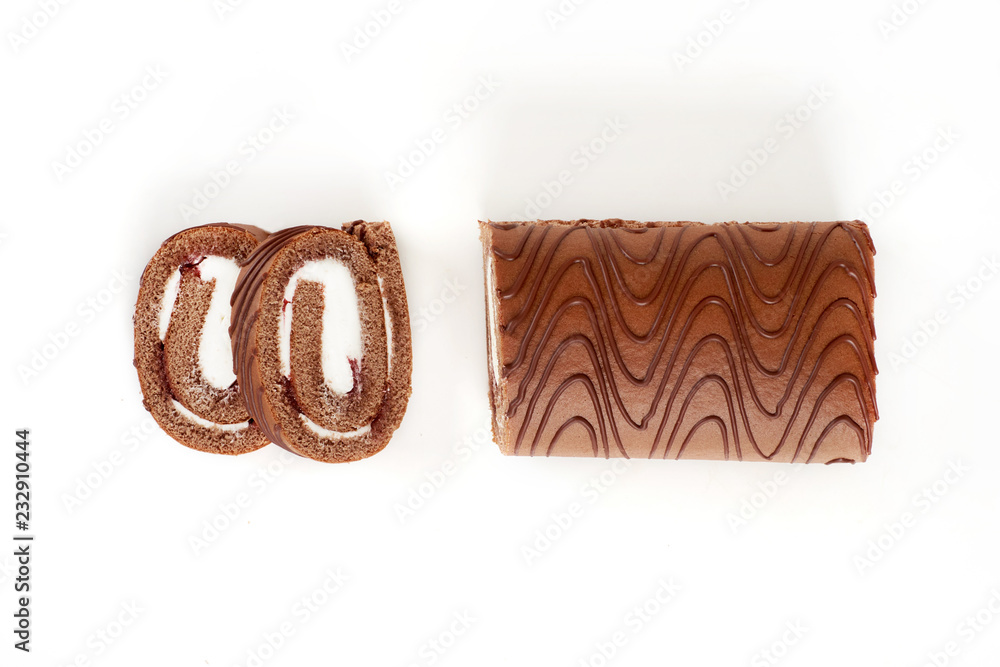 Chocolate biscuit roll cake isolated on white background. Chocolate biscuit roll cake isolated on white background.