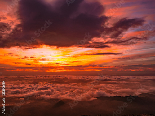 Beautiful Sunrise Sky with Sea of the mist of fog in the morning on Khao Luang mountain in Ramkhamhaeng National Park,Sukhothai province Thailand © Sumeth