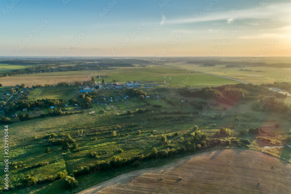 Russia, a typical rural settlement. Evening shot from the air
